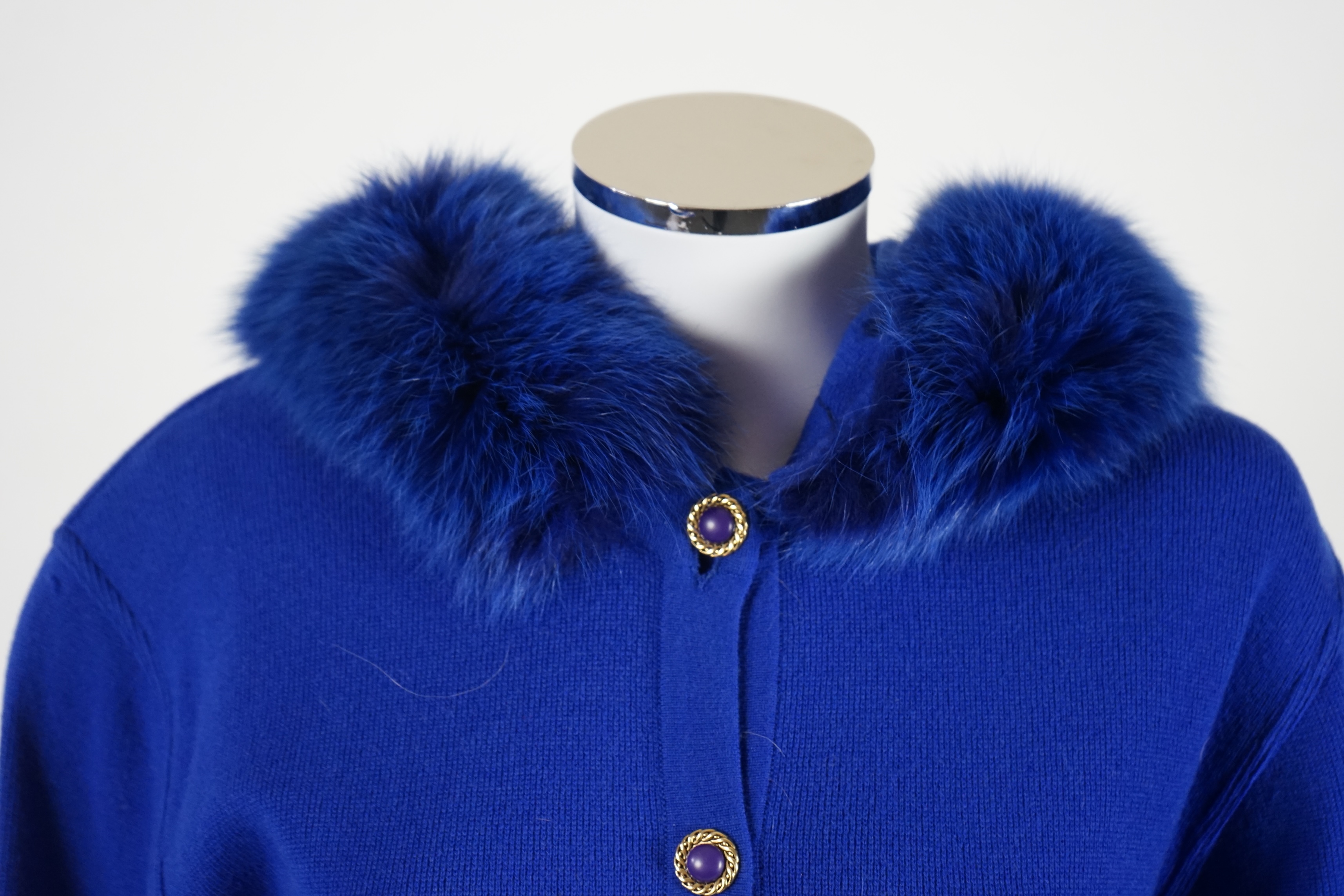 A Vera da Pozzo knitted royal blue suit with fur detail, knitted dress with fur cuffs and additional knitted skirt. Approx size 10-12 Proceeds to Happy Paws Puppy Rescue